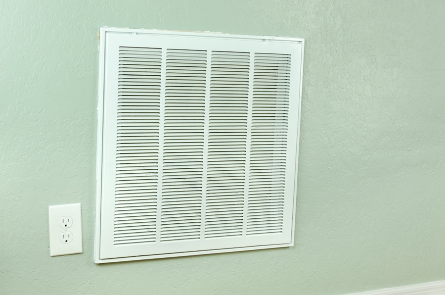 Home air conditioner and heating air filter intake vent on wall that leads to the handler. What You Should Know About Air Handlers.